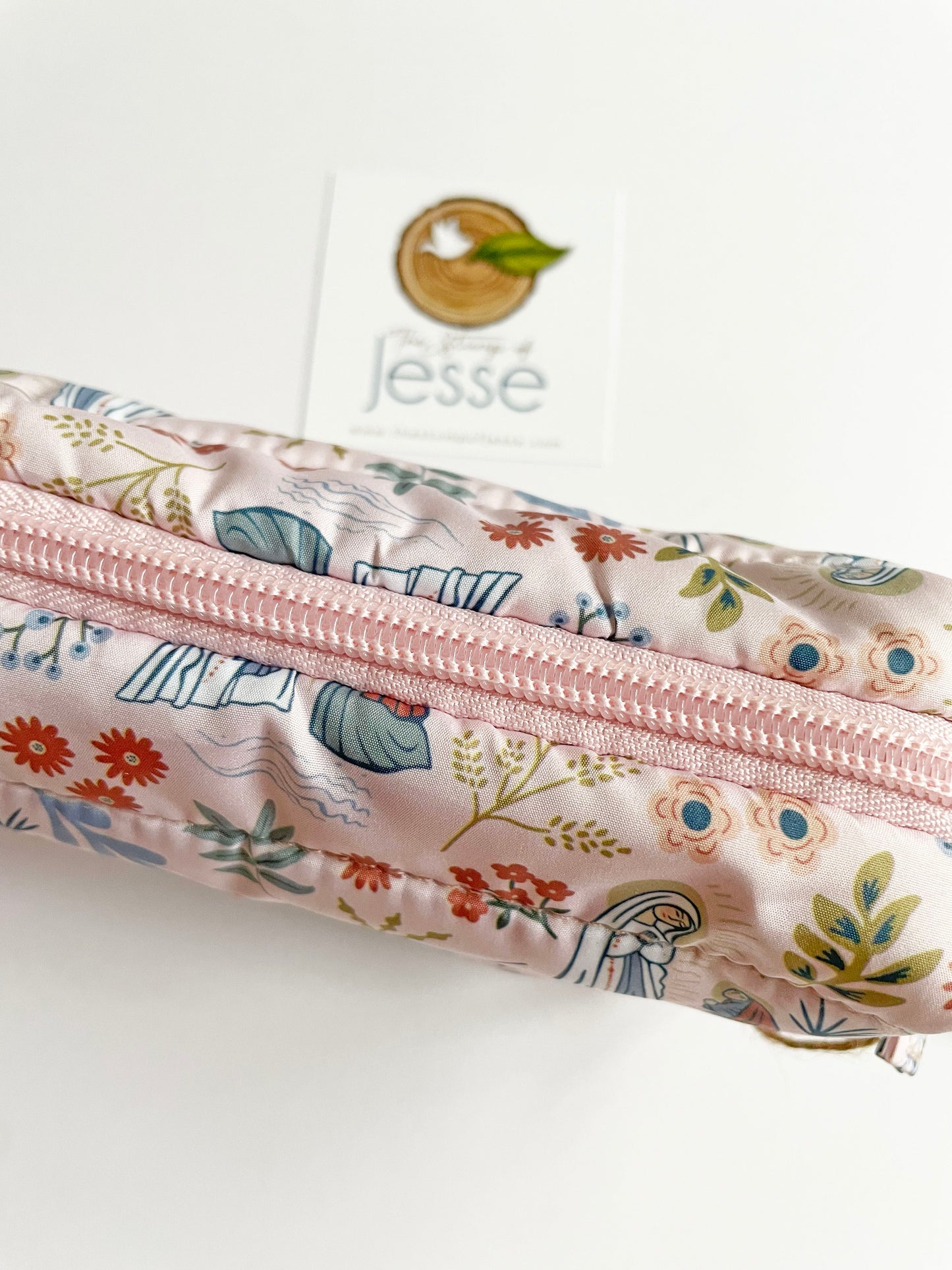 Our Lady of Lourdes pink lightweight, waterproof puffer pouch